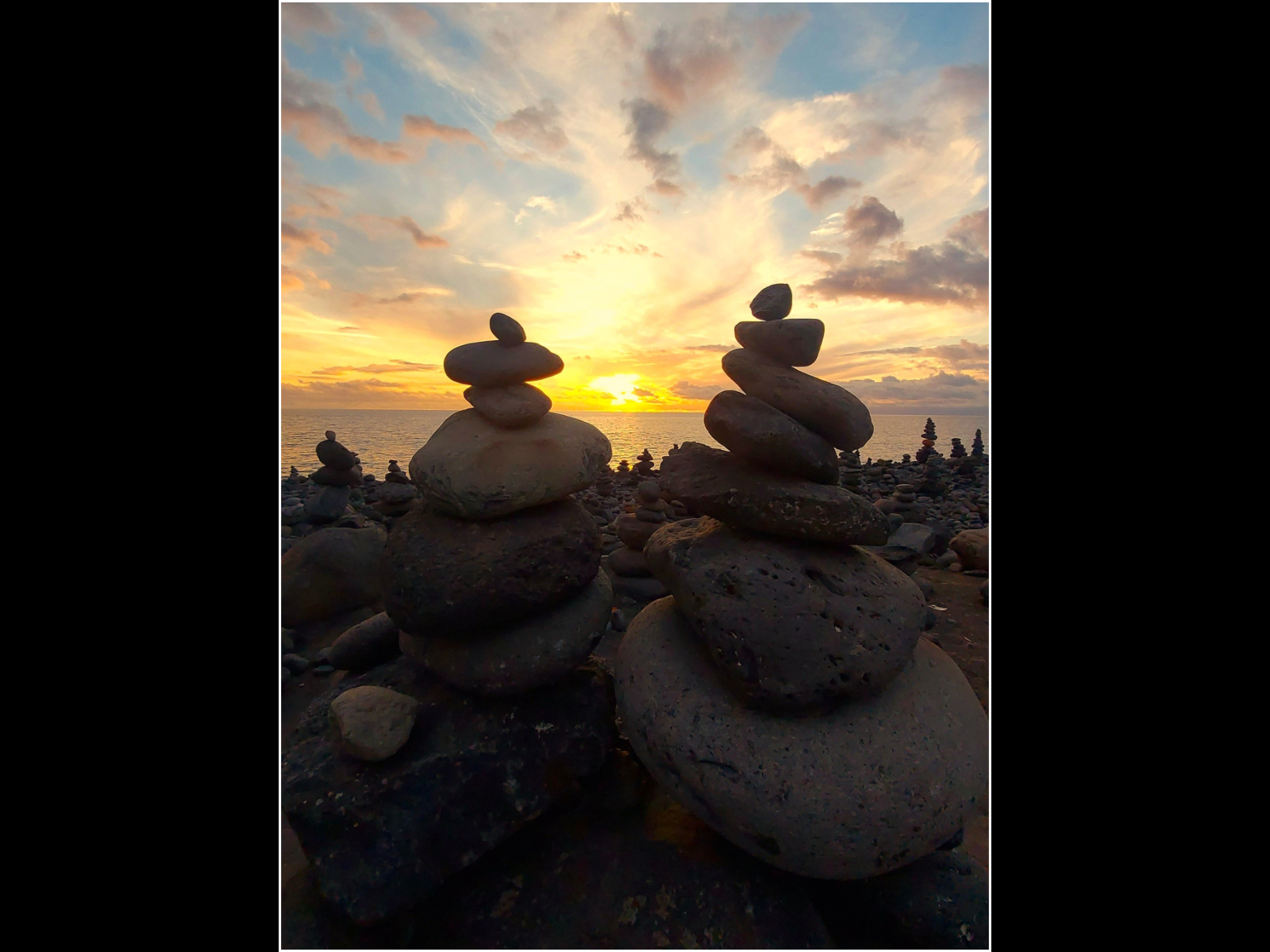 Cairns at Sunset by Mike Hortop Cairns at Sunset