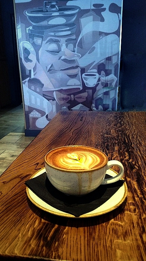 COFEE SERVED WITH A SMILE by Neil Scarlett COFEE SERVED WITH A SMILE