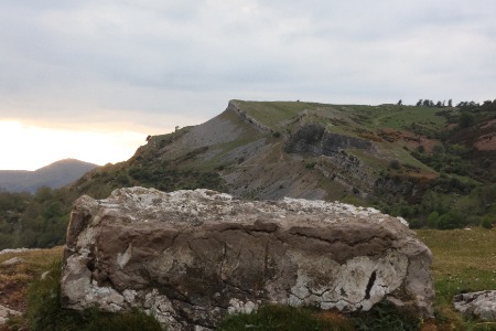 Rock hiding the parked cars