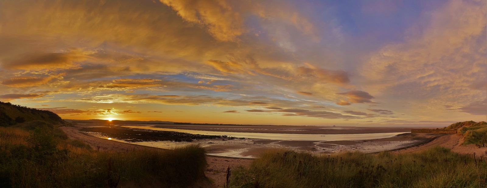 Sunset over Budle Bay towards Holy Island