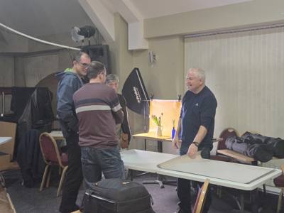 Chatting about a still life set-up.