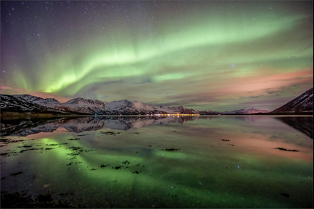 Aurora Reflections With Light Pollution