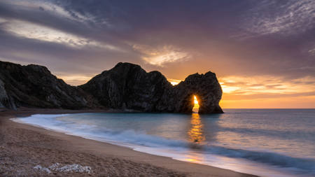 Sunrise Through The Arch
