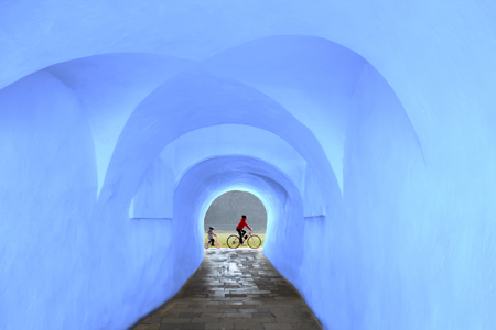 Cyclist In Red