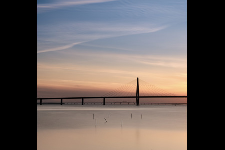 Faro Bridge At Sunset