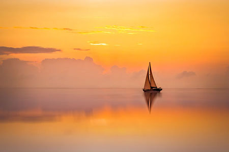 Sailboat In Sunset