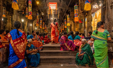 DEVOTEES IN COLORFUL SAREES