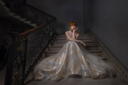 Seated On The Stairs