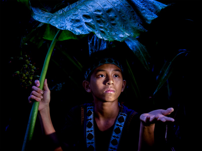 Child Hiding From The Rain