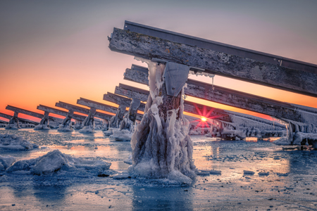 Sunrise At The Frozen Icebreakers Marken Netherlands