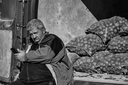 Potato Merchant Waiting For Clients