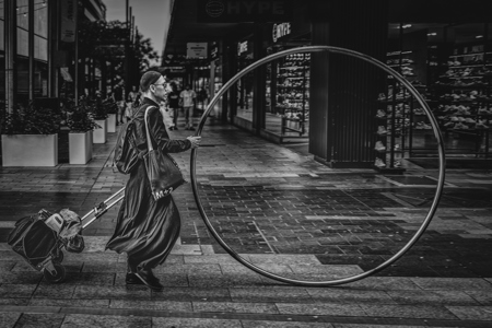 Man Walks A Hoop