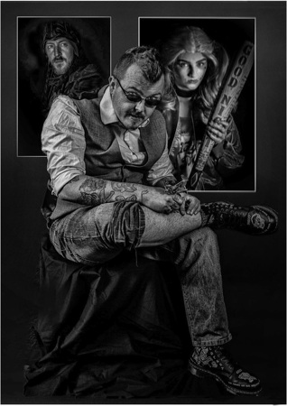 Tatoo Artist At Work On Himself