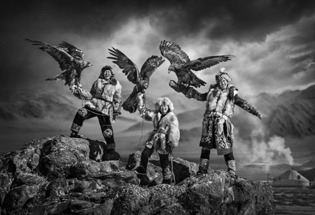 Happy Hunters At Mountain