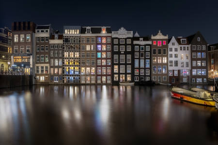 LIT WINDOWS ON QUIET WATER