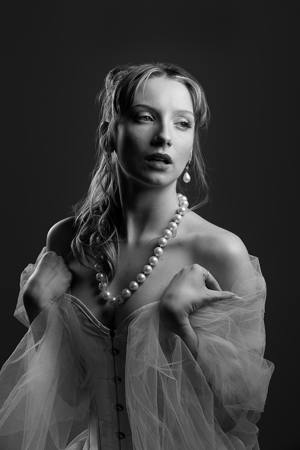 Lady With Pearl Necklace