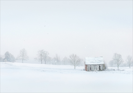 Old hut in winter scene