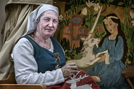 Medieval woman sewing