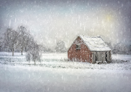 Log shack in snowy landscape